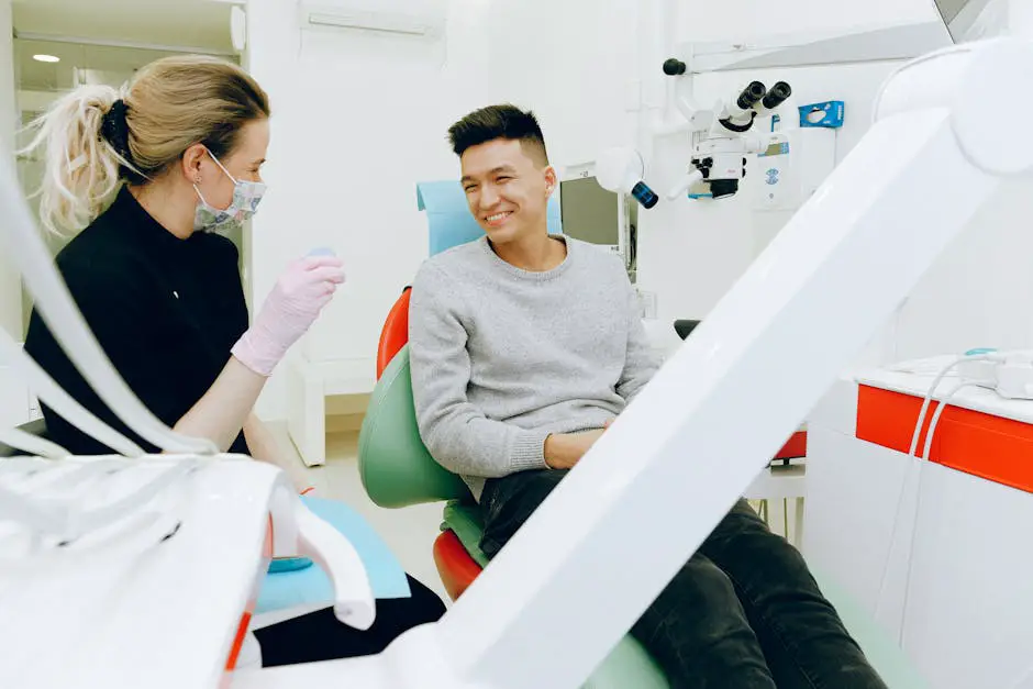 Dentist at Beacon Smiles Dental discussing Invisalign treatment with a patient