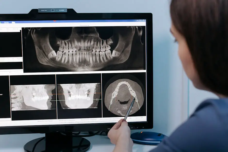 Dental professional examining high-resolution images of celebrity teeth