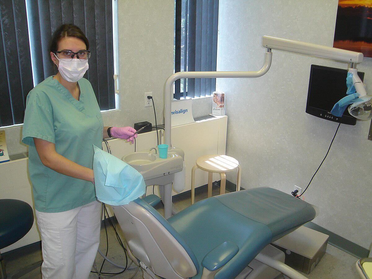 A patient receiving a warm welcome and Invisalign consultation at Dental Care of Georgetown