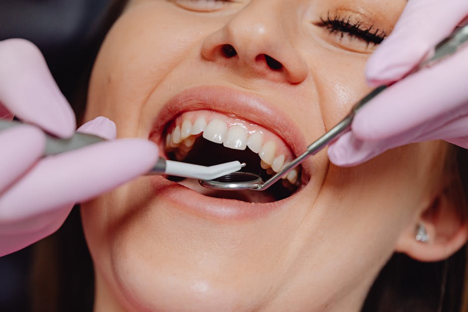 Dr. Heather Brown examining a patient's teeth, demonstrating her attention to detail and friendly demeanor