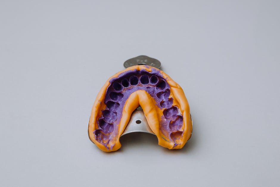 A close-up view of the JawTrac device, highlighting its unique design and advanced features for non-surgical jaw alignment correction